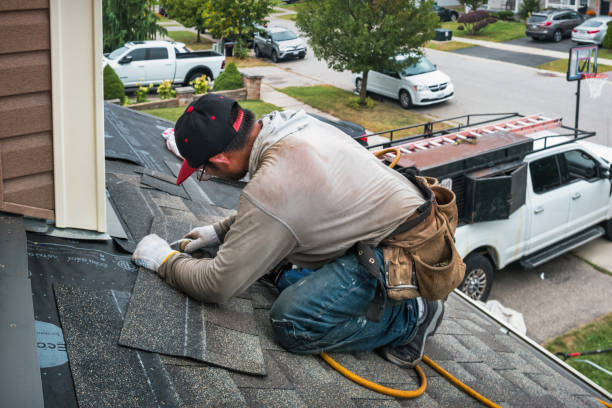 Professional Roofing technician working in West Medford, MA